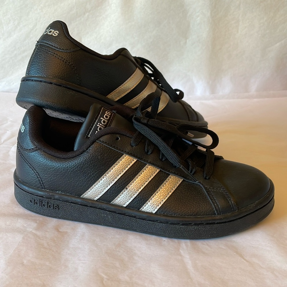 Adidas sneakers black with silver stripes size 6.5‎
